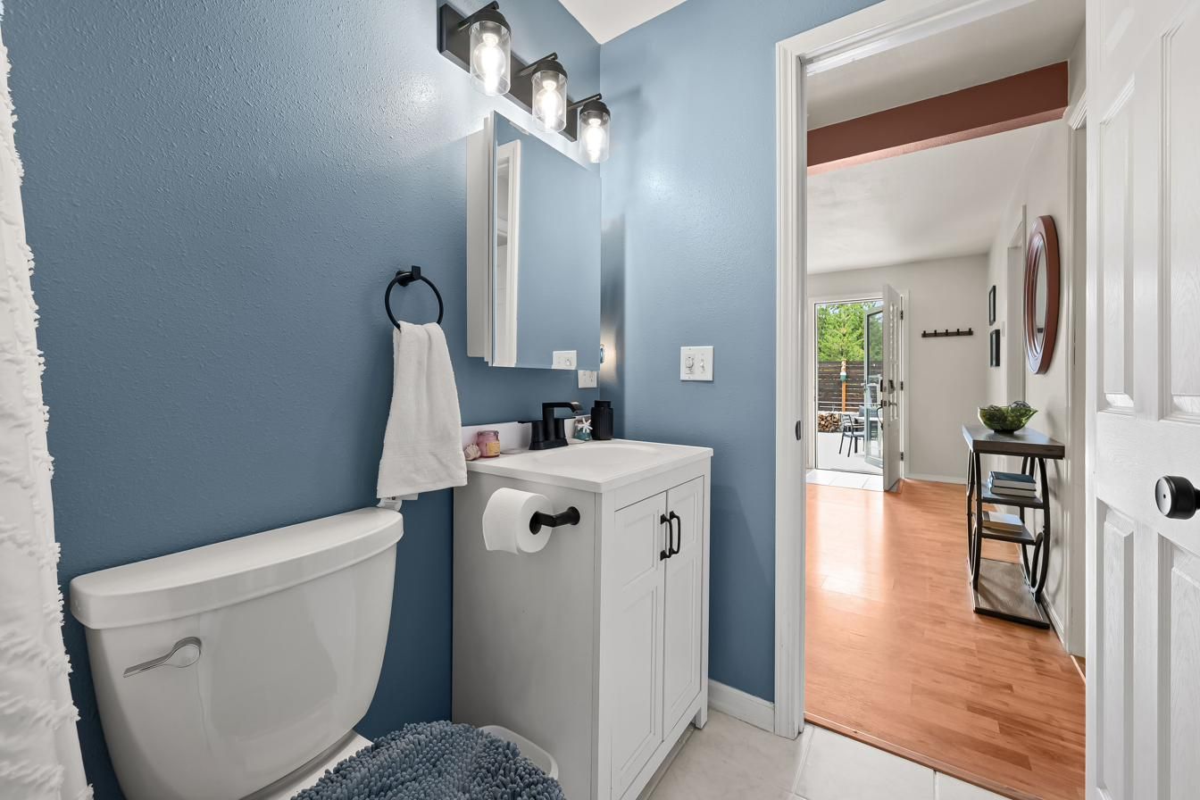 Bathroom vanity with the hall beyond