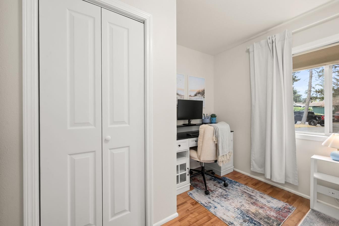 Bunk room closet, desk and window