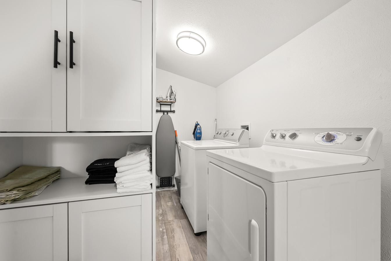 Washer and dryer with towel storage in the mud room